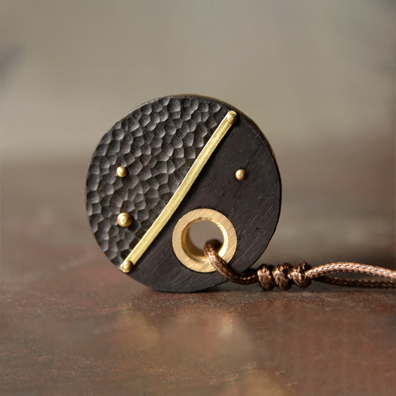 Collana con ciondolo in legno di ebano e rame, realizzata a mano , Buddha Stones, simbolo della pace
