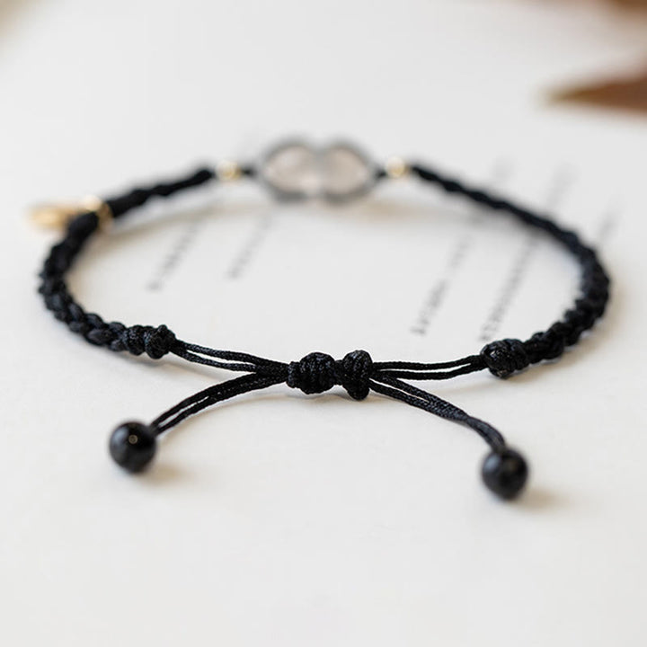Braccialetto con corda positiva con fibbia rotonda in calcedonio Buddha Stones