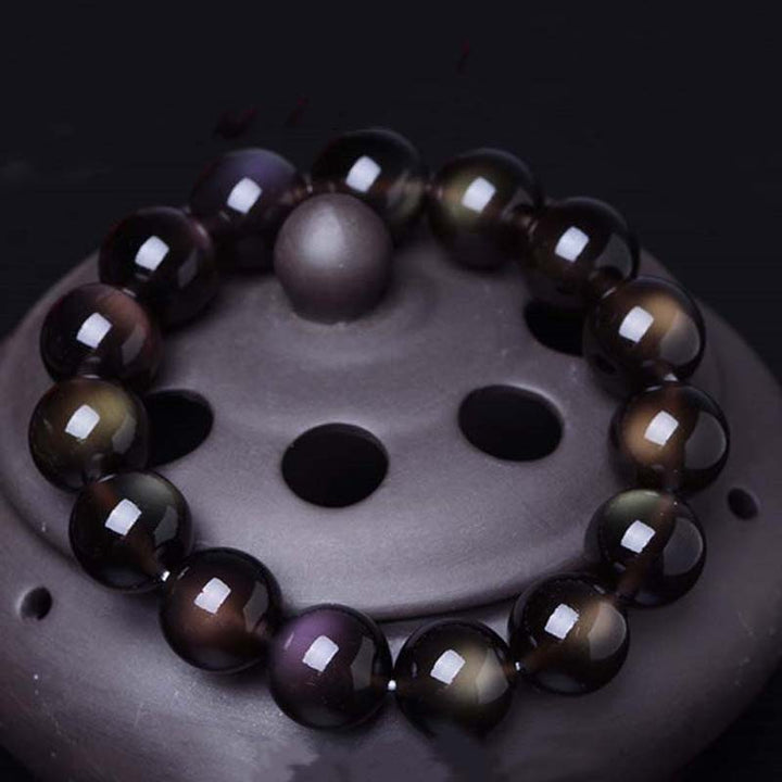 Braccialetto positivo in ossidiana arcobaleno naturale Buddha Stones