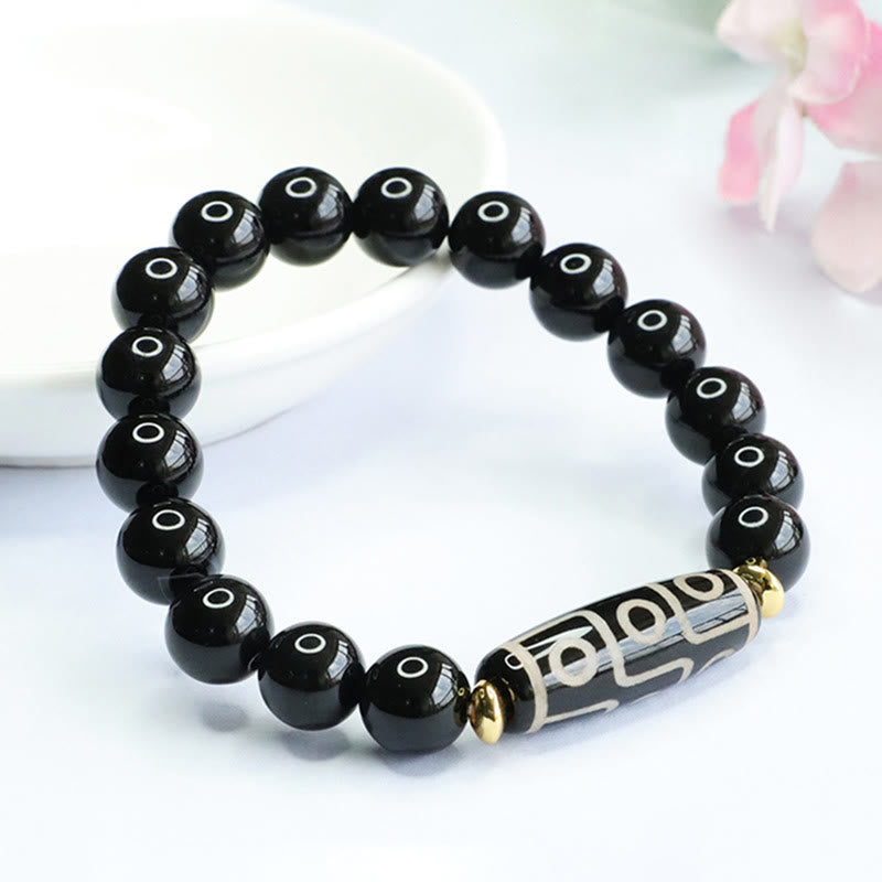 Braccialetto di potere in onice nero con perline Dzi tibetane a nove occhi Buddha Stones