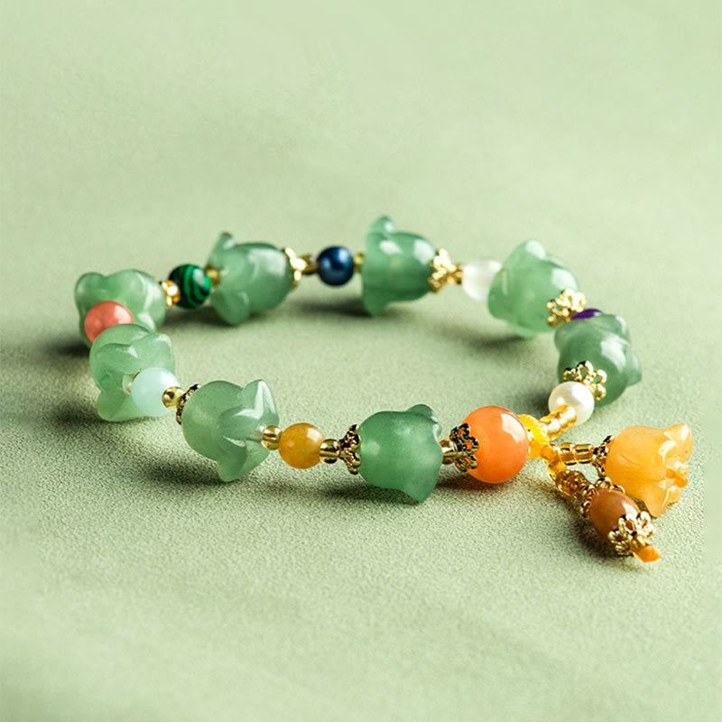 Braccialetto della fortuna con fiore di magnolia, avventurina verde Buddha Stones