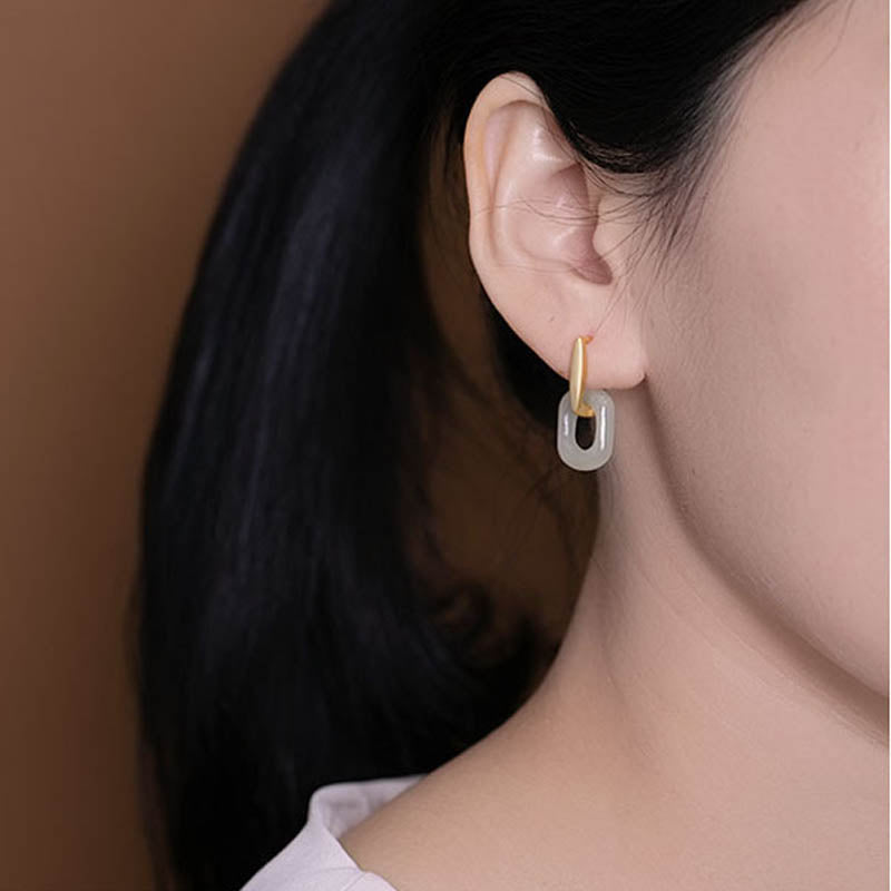 Orecchini Buddha Stones in argento sterling 925 con giada bianca rotonda e benedizione della felicità