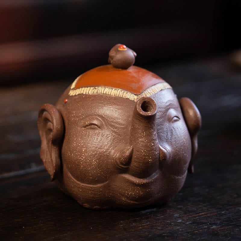 Teiera in ceramica viola con Buddha Stones, elefante carino e nuvole di buon auspicio