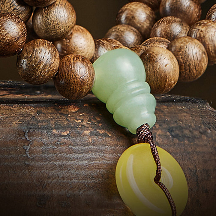 Buddha Stones 108 perle di Mala Kalimantan Agarwood Zucca Giada Ambra Bracciale equilibrio
