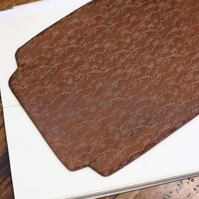 Elegante sottobicchiere per tazza da tè con motivo broccato floreale