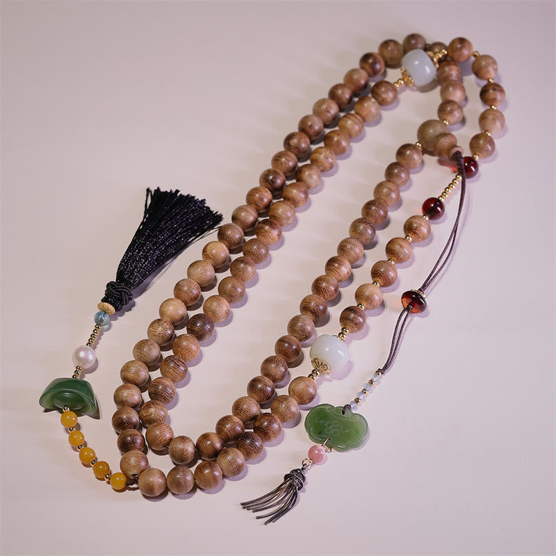 Braccialetto con ciondolo Ruyi in lingotto di giada ambrato naturale con Buddha Stones agarwood