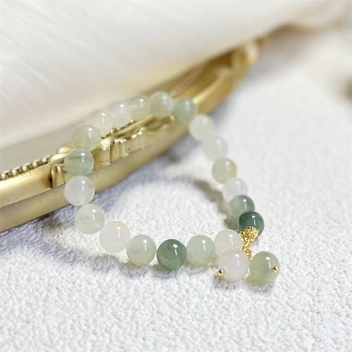 Braccialetto con ciondolo a forma di perlina di fortuna con abbondanza di giada sfumata naturale Buddha Stones