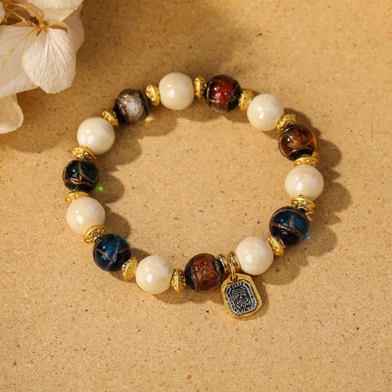 Buddha Stones Tibetano Zakiram Dea della Ricchezza Ciondolo Liuli Vetro Incenso Cenere Perline di Porcellana Braccialetto di Protezione
