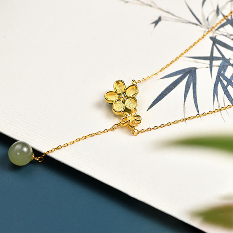 Collana con ciondolo portafortuna in argento sterling 925 con fiore di prugna in giada ciano Hetian, motivo Buddha Stones