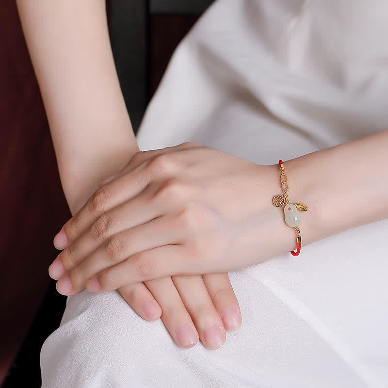 Braccialetto in argento sterling 925 con cordino rosso e giada bianca Hetian dell'anno del coniglio