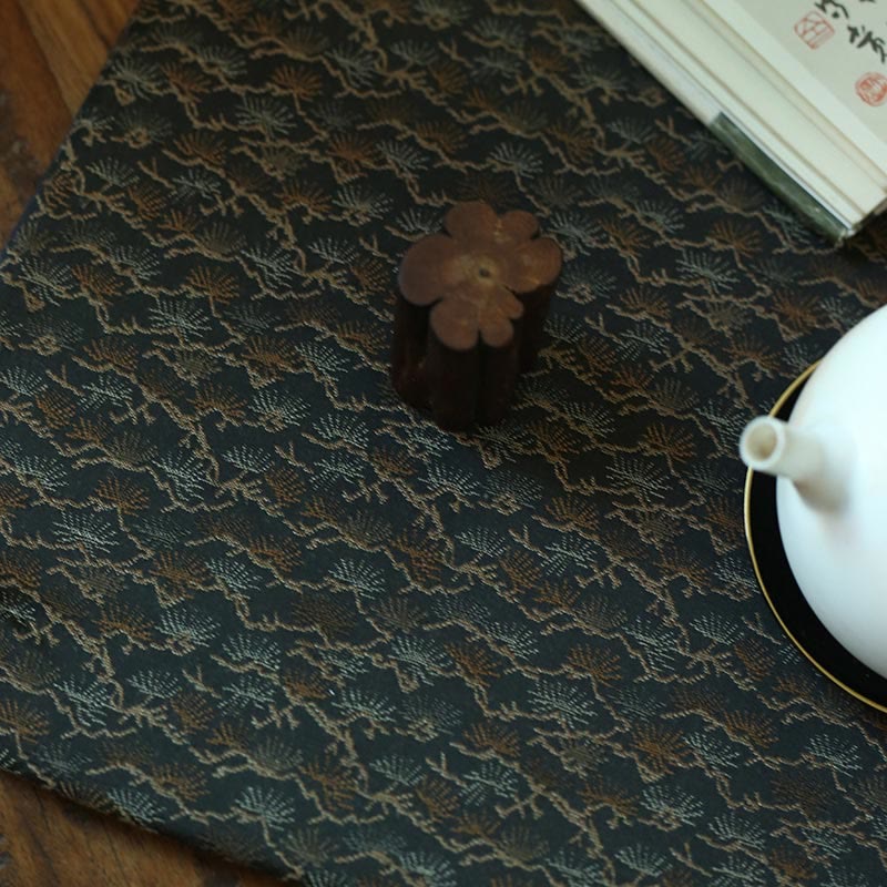 Elegante sottobicchiere per tazza da tè con motivo broccato floreale