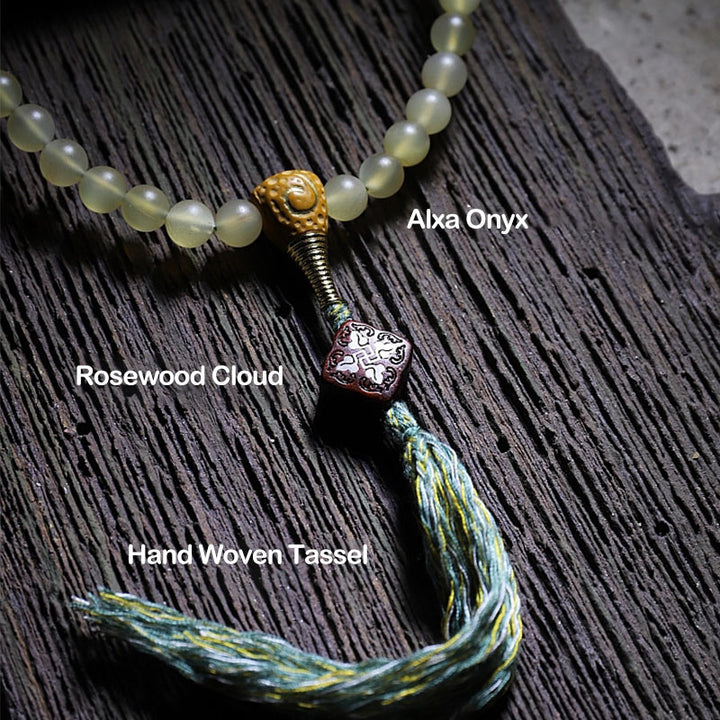 Braccialetto della fortuna in ambra e corno di pecora del Tibet con 108 perle di Mala Buddha Stones