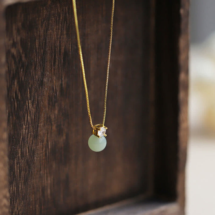Collana con ciondolo a catena con perline portafortuna in giada Buddha Stones