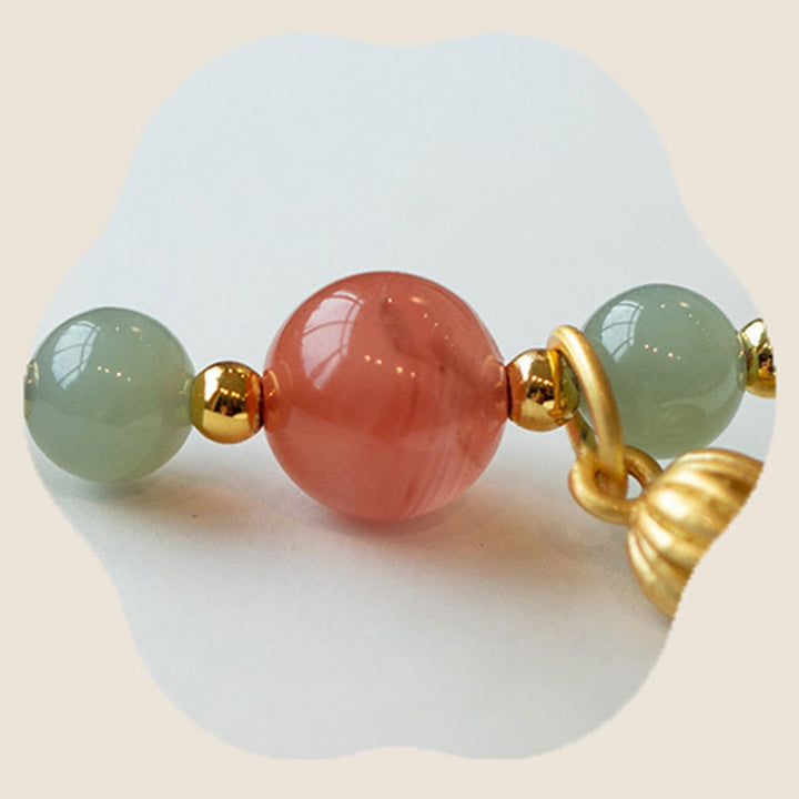 Braccialetto Buddha Stones Red Agate Jade Lotus Confidence Calm String