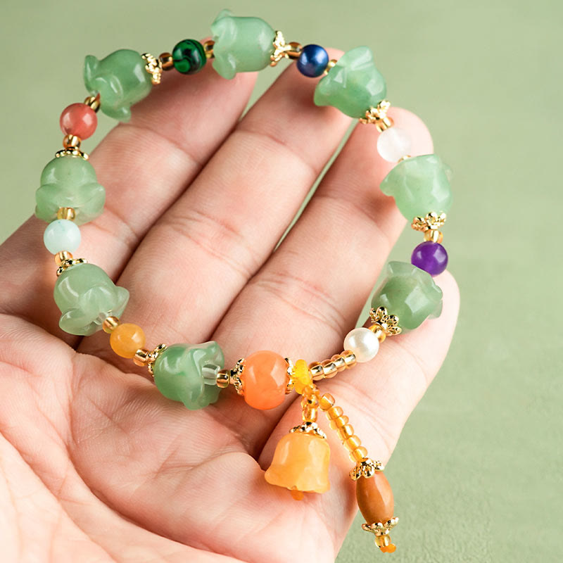 Braccialetto della fortuna con fiore di magnolia, avventurina verde Buddha Stones