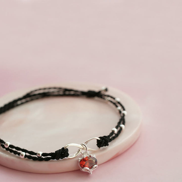 Cavigliera intrecciata con Buddha Stones, simbolo dell'amore, cuore e infinito