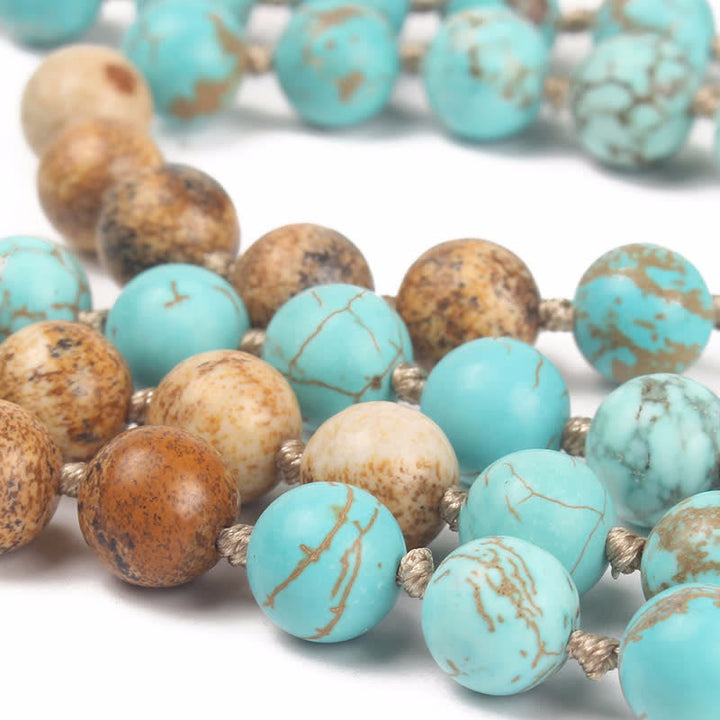 Buddha Stones con 108 perle di Mala in turchese e diaspro con nappa della saggezza