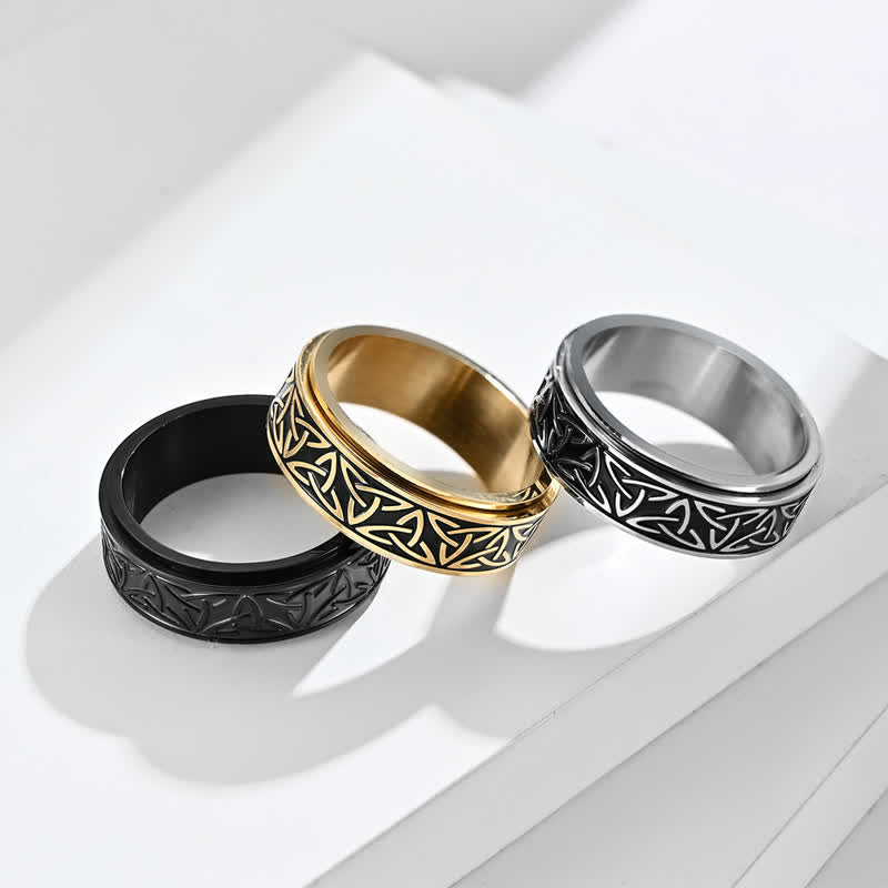 Anello girevole calmo in acciaio al titanio con nodo triangolare in Buddha Stones