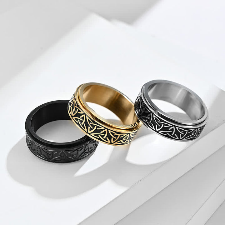 Anello girevole calmo in acciaio al titanio con nodo triangolare in Buddha Stones