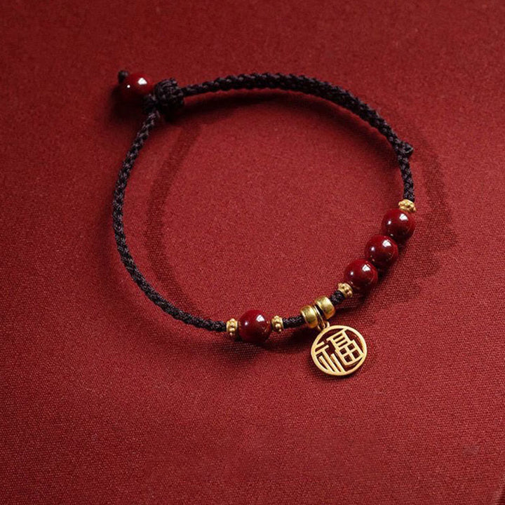 Braccialetto con corda intrecciata con Buddha Stones, perline di cinabro e carattere Fu