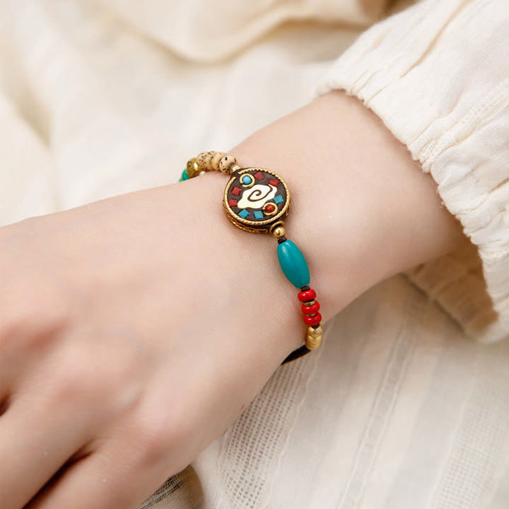 Braccialetto di protezione e forza Buddha Stones in turchese tibetano Om Mani Padme Hum