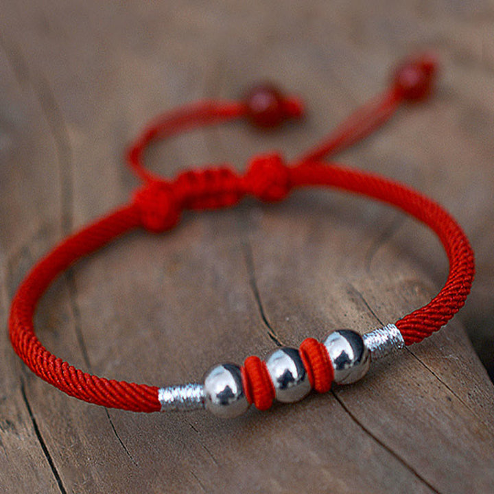 Braccialetto di corda rossa con perline portafortuna in argento sterling 925 Buddha Stones