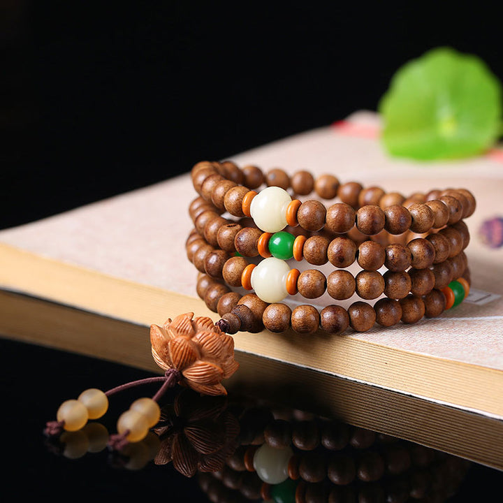 Buddha Stones 108 Mala Beads Legno di Pesca Bodhi Seed Lotus Preghiera Meditazione Bracciale