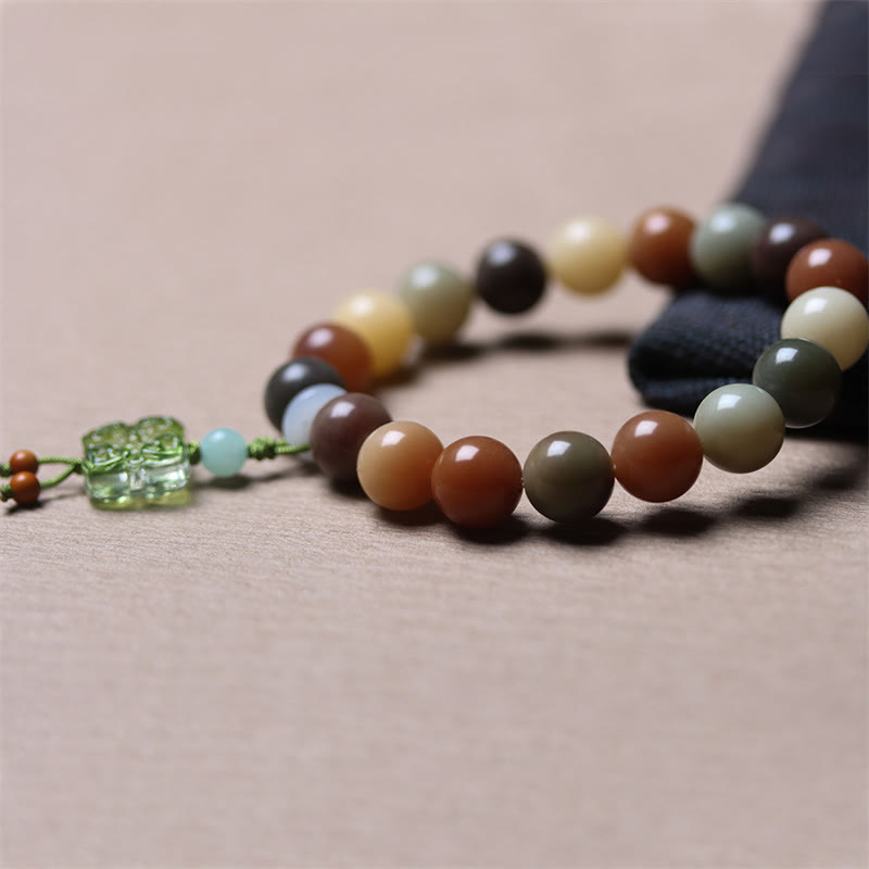 Braccialetto della pace con ciondolo in vetro Liuli con semi di Bodhi multicolore sfumato naturale Buddha Stones